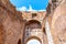 ROME, ITALY - MAY 06, 2019: Colosseum, Coliseum or Flavian Amphitheatre, interior corridors with arches - architectural