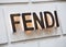 Rome, Italy - May 13, 2018: Fendi logo on wall at store in Rome.