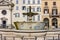 Rome, Italy - October 2022: One of twin fountains on Piazza Farnese square