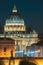 Rome, Italy. Papal Basilica Of St. Peter In The Vatican And Aelian Bridge In Evening Night Illuminations