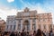 Rome, Italy -  September 2022 - People In front of the Trevi`s Funtain in the Center of Rome at Sunset