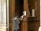 ROME, ITALY- SEPTEMBER 30, 2015: boy performing catholic confession at the basilica santa maria maggiore, rome