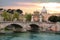 ROME, ITALY. St Peter`s basilica in Vatican, river Tiber view and Roma`n bridge