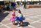 RONDA, ANDALUSIA/SPAIN - SEPTEMBER 10: Three little girls in traditional spanish dress dancing in the square. The local holiday of