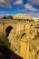 Ronda, Spain - September 06, 2015: The Puente Nuevo is the newest and largest of three bridges that span the 120-metre-deep chasm