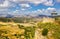 Ronda, Spain - September 06, 2015: Wide angle view of famous Ronda village situated solely on mountaintop against dramatic clouds