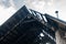 The roof of a burned house in a fire, charred boards, the consequences of arson