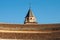 The roof of the Cathedral of Granada in the blue sky.