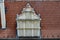 Roof decorative element covering the attic window