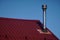 Roof of the house. Trumpet. Wood and roof tiles. Architecture. Texture.