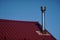 Roof of the house. Trumpet. Wood and roof tiles. Architecture. Texture.