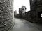 On the roof, inside of the medieval castle Gravensteen Castle of the Counts on cloudy day, stone walls and balustrade. Ghent