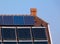 Roof installed solar panel detail under blue sky