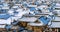 Roof of Jeonju traditional Korean village covered with snow.