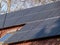 Roof with mounted and installed photovoltaic solar panels on the roof. Rooftop with solar cells for heating and electricity