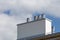 Roof of the new modern house with gutter and ventilation chimneys