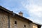 Roof of an old french building with chimney