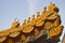 Roof panels with small mystical figures