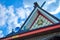 Roof of a Shinto shrine with ornamental mirror