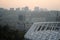 Roof of stadium and cityscape behind on city background. Soccer stadium