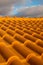 Roof tiles and moody sky