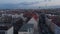 Roof top view of building in streets of Berlin near TV Tower (Fernsehturm) after sunset. Panning footage of large city