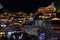 Roof tops at night in Old town of Lijiang, Yunnan, China with traditional chinese architecture