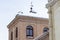 roof of the tower of the major college of Saint Pedro and Saint Pablo covered with snow in the city of Alcala de Henares with