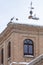 roof of the tower of the major college of Saint Pedro and Saint Pablo covered with snow in the city of Alcala de Henares with