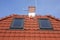 Roof windows, clay tiles, chimney and lightning