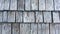 roof wood shingles in close-up gray natural background abstract background arranged in rows