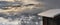 roof of a wooden chalet snowy with view on alpine mountain in winter