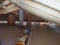 roof works with wooden beams and self levelling concrete floor
