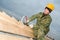 Roofer with hand snips