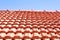 Roofing construction. Roof ceramic tiles on blue sky background