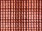 Roofing texture. Red corrugated tile element of roof.