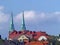 Roofs and church towers at sunset