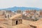 Roofs of Girona on the background of the mountains