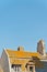 Roofs and houses of Saint Malo in summer with blue sky. Brittany.