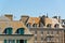 Roofs and houses of Saint Malo in summer with blue sky. Brittany.