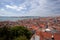 Roofs of Lisbon, Tagus river, bridge and Christ St