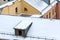 Roofs of urban houses in snow