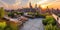 Rooftop Garden Terrace with Urban Skyline at Sunset. Resplendent.