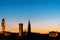 Rooftop panorama of Florence at sunset during blue hour with Palazzo Vecchio town hall, Chiesa Orsanmichele church and the Moon in