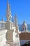 The rooftop of Sao Vicente de Fora Church with ornately decorated sections in the Baroque style: View towards The National Panth