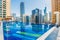 Rooftop swimming pool with views of numerous huge skyscrapers. The concept of amazing places for sightseeing and