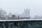 Rooftop view toward City College during a winter storm with heavy snowfall in Harlem, New York, USA