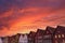 Rooftops from Bryggen in Bergen/Norway with dramatic colored red skies during sunset. Unesco world heritage site