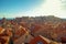 Rooftops inside the old city of Dubrovnik, old stone houses with bright red brick roofs. As seen while walking along the city