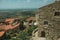 Rooftops of old houses and stone facade in Monsanto